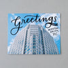 Greetings from Winston-Salem, NC, home of the phallic Wells Fargo skyscraper. Postcard by Em Dash Paper Co.
