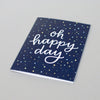 Navy blue card with confetti and modern calligraphy by Em Dash Paper Co. Oh happy day!