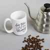 The perfect companion for your morning coffee, this mug will remind you to do the damn thing. White ceramic and holds 15 oz. By Em Dash Paper Co.