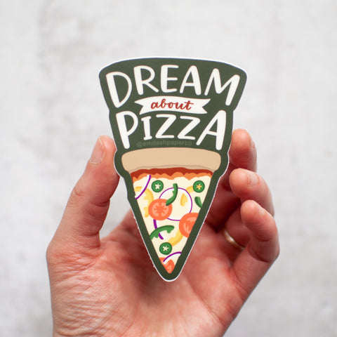 Dream about pizza! Vinyl sticker with hand lettering and an illustrated slice, by Em Dash Paper Co.