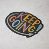 An encouraging sticker for your mirror at home, or anywhere else you want to put it. Keep going! Hand lettered by Em Dash Paper Co and printed in Winston-Salem, NC.